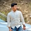 Aman K